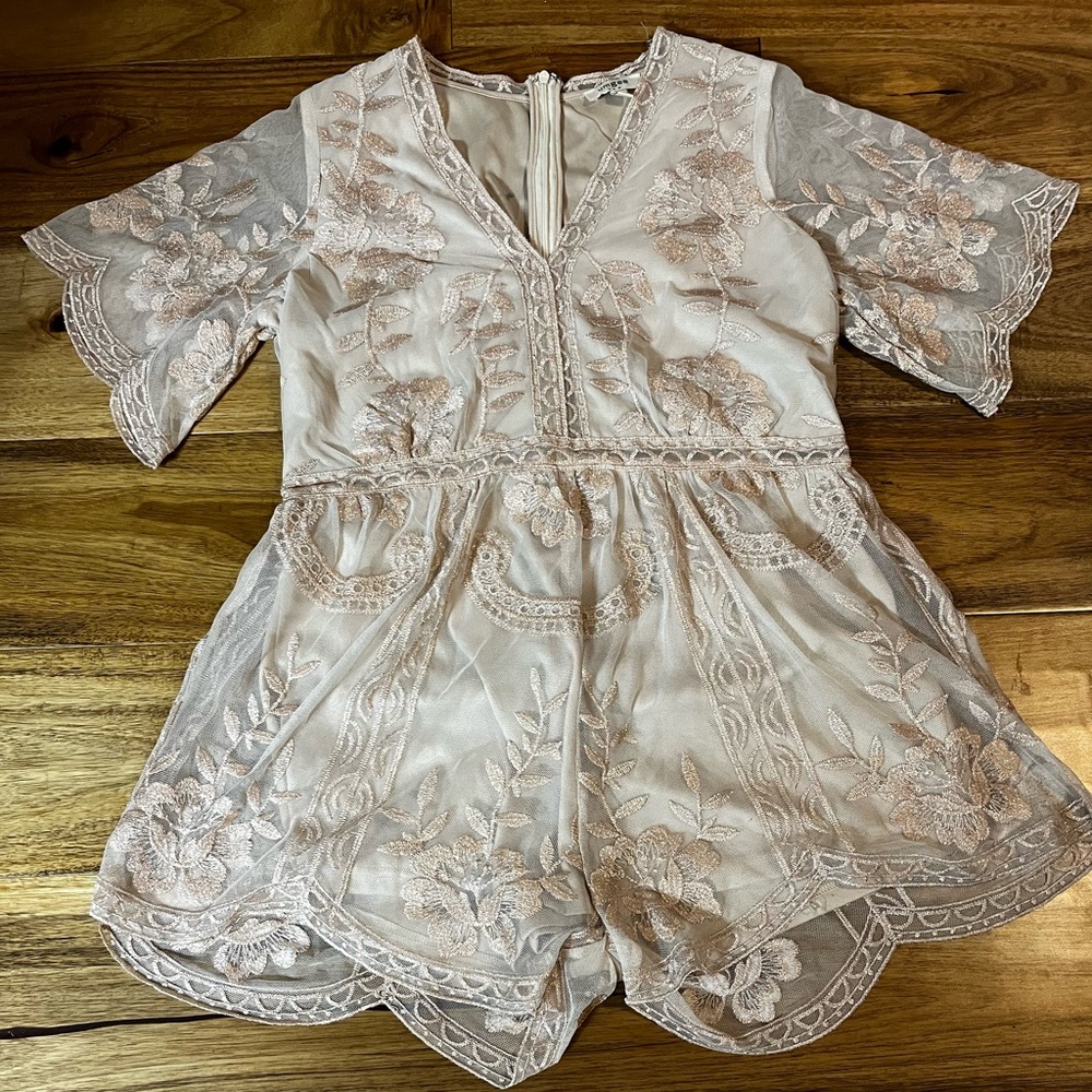 Rose gold and nude romper with flutter sleeves. Never worn.